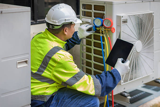 Professional Hvac technician working in Chatham, IL